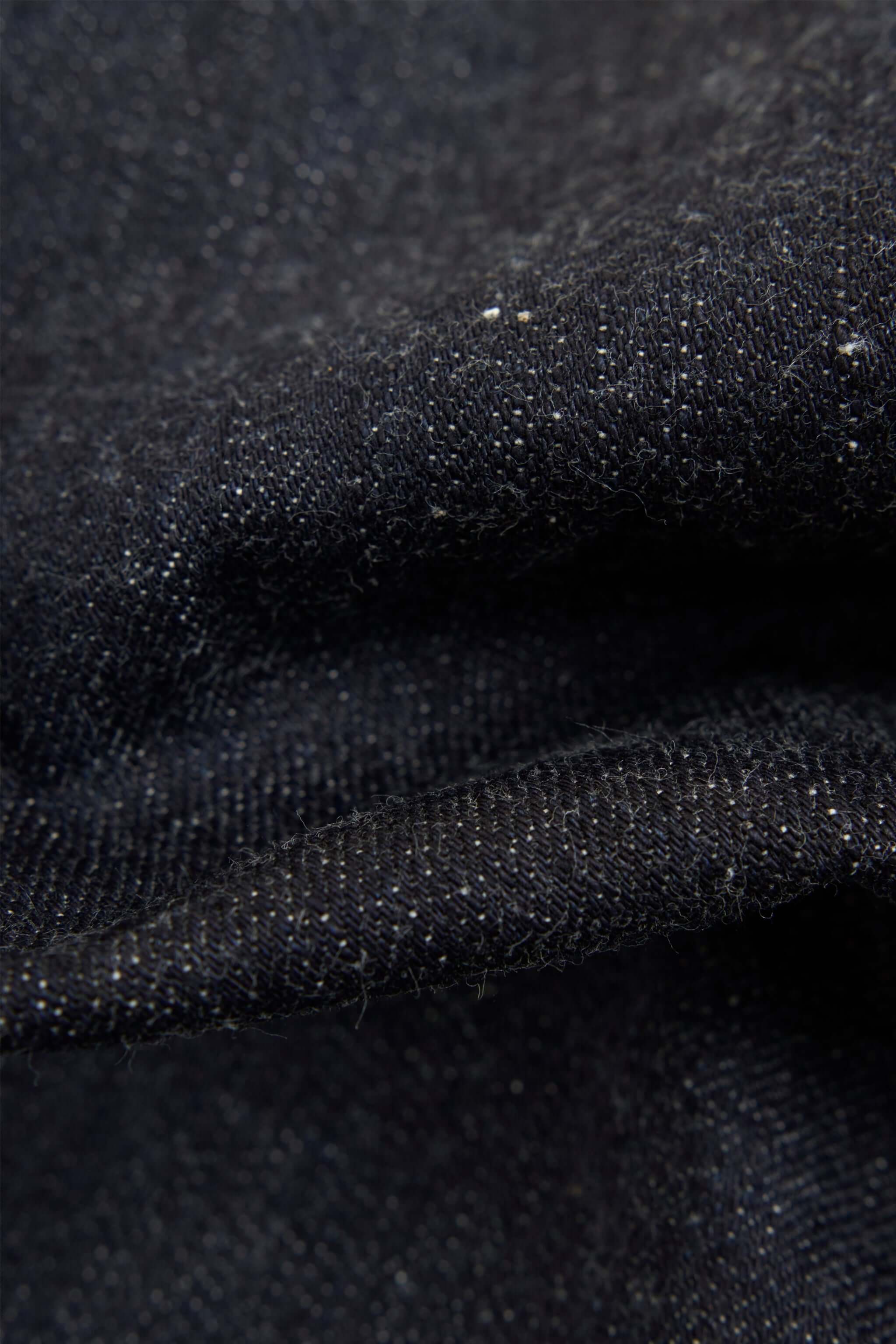 Graph Zero Heritage Denim - 13oz fabric texture showing the clean, even yarn structure and rich color.