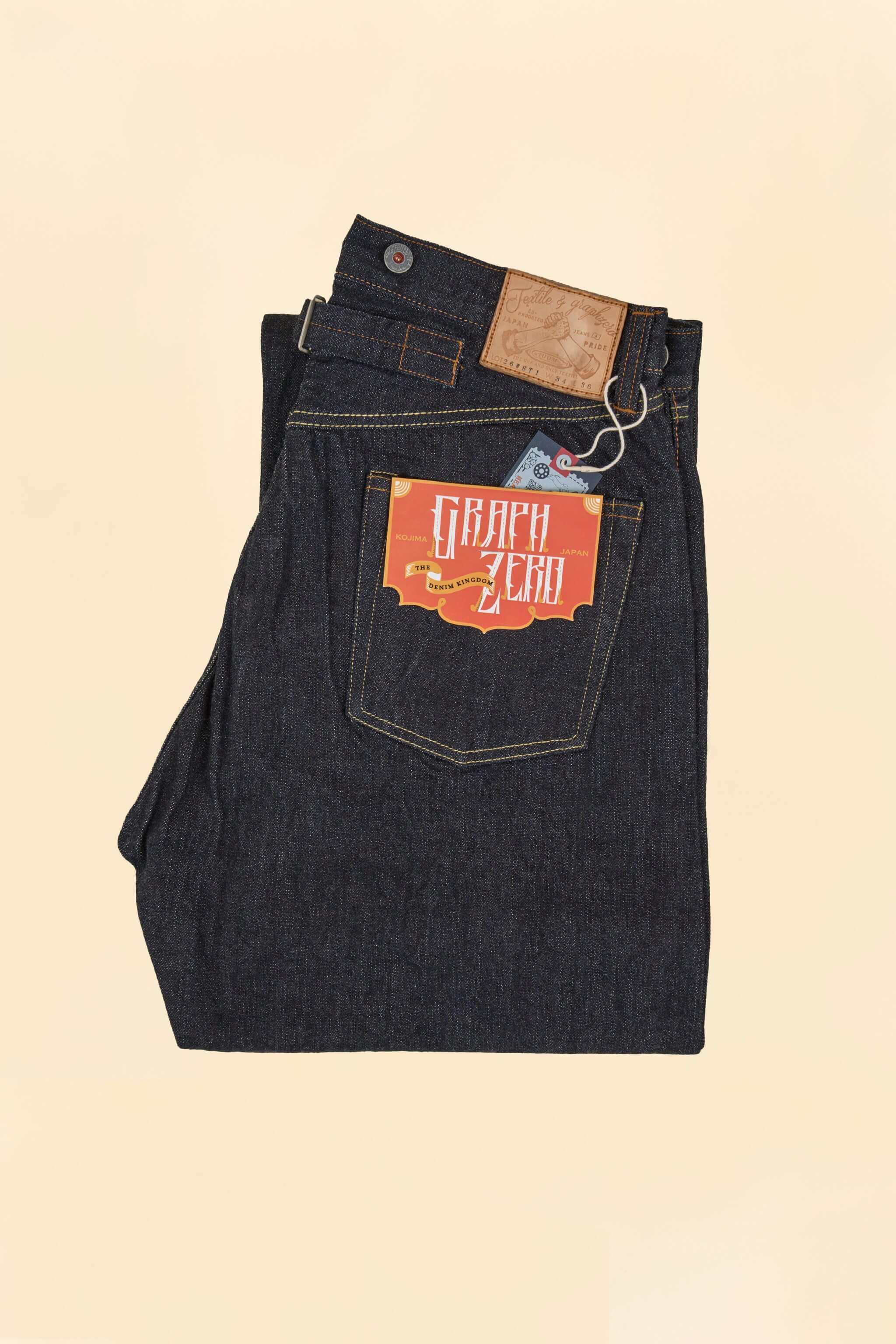 Graph Zero Heritage Denim - 13oz displayed neatly with a focus on the unique tag and vintage design features.