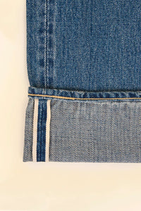 Godspeed 1950UV Selvedge Jeans – vintage wash chain-stitched hem and roping and selvedge ID close-up.