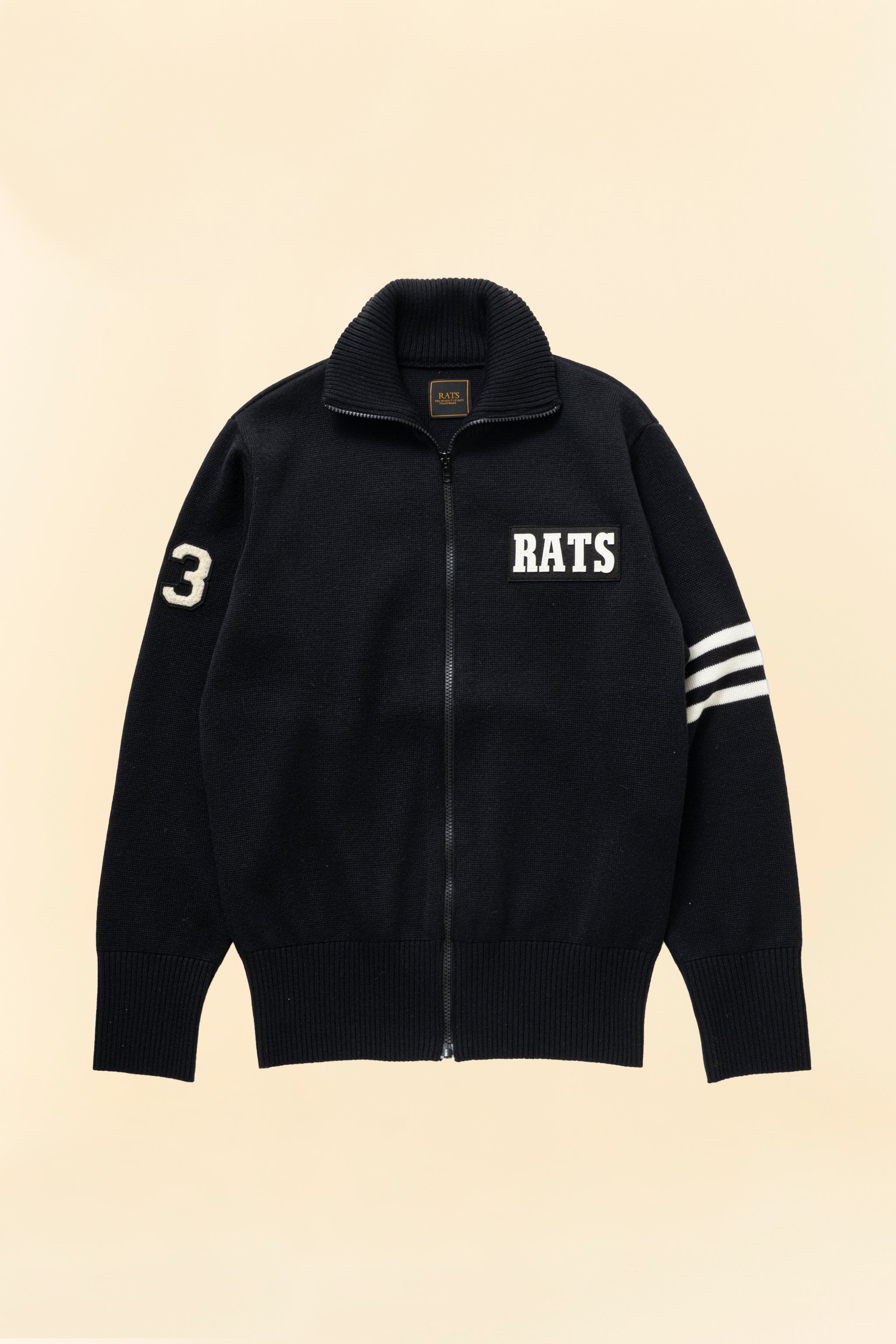Black knit jacket with 'RATS' and number '3' and three stripes on the arm
