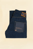 Godspeed 1950 “U” 13oz Wide-Straight Japanese Selvedge Jeans – folded view showing environmentally printed label and leather patch
