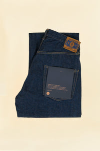 Godspeed 1950 “U” 13oz Wide-Straight Japanese Selvedge Jeans – folded view showing environmentally printed label and leather patch
