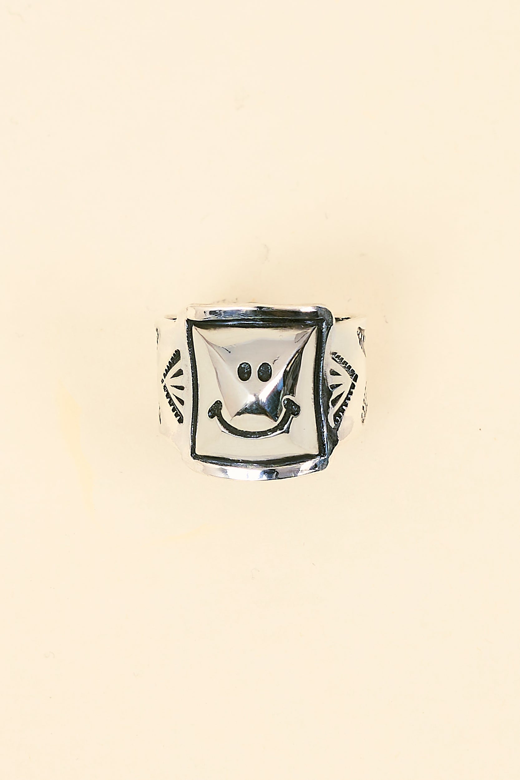 Munqa Pyramid Smile Ring