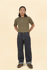 Graph Zero Heritage Denim - 13oz model wearing wide straight silhouette with t-shirt and shoes