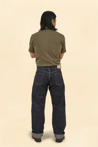 Model wearing Graph Zero Heritage Denim - 13oz, showcasing the back view and wide straight silhouette.